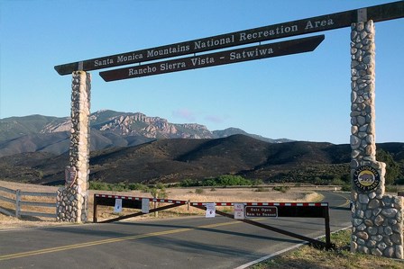 Large stone and wood archway at the entrance to Rancho Sierra Vista