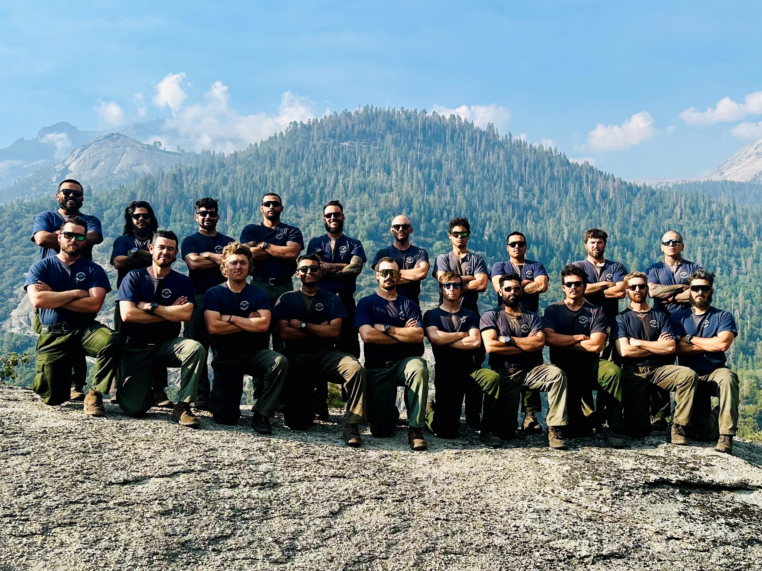 20 Arrowhead hotshots pose in 2 rows