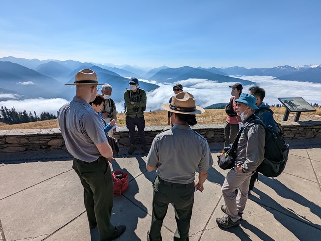 NPS Rangers address the Japanese students learning about interpretation.