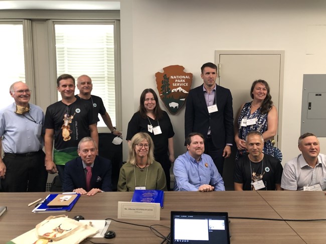 The delegation from the Baltic countries pose for a picture after meeting with NPS staff at the Washington Office headquarters building.