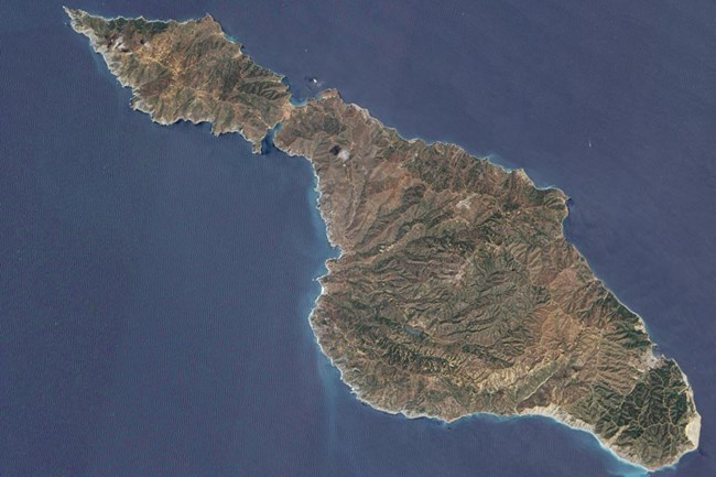 lt= Aerial view of skinny island.