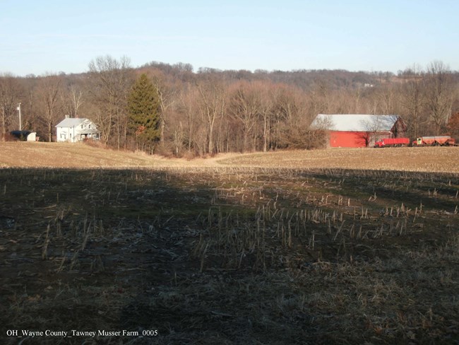 Farmhouse and Barn set on farmland