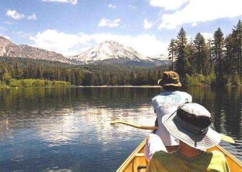 Canoeists explore Manzanita Lake in Lassen Volcanic National Park.