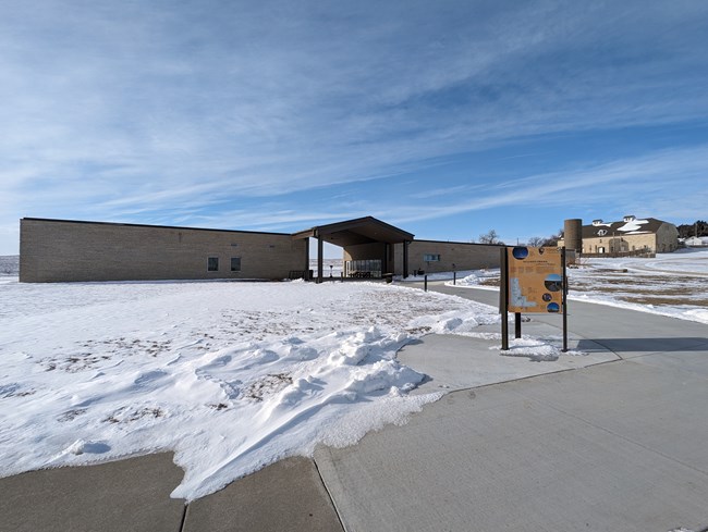 Visitor center buildings covered in white snow