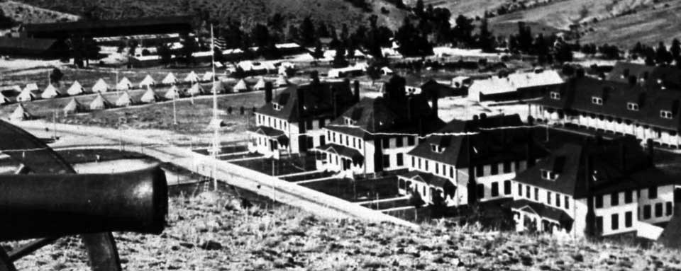 View of Fort Yellowstone with a cannon in the foreground.