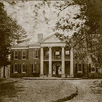 two-story home with columns