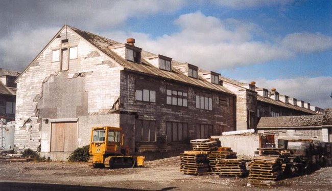 a large decrepit building a large decrepit building