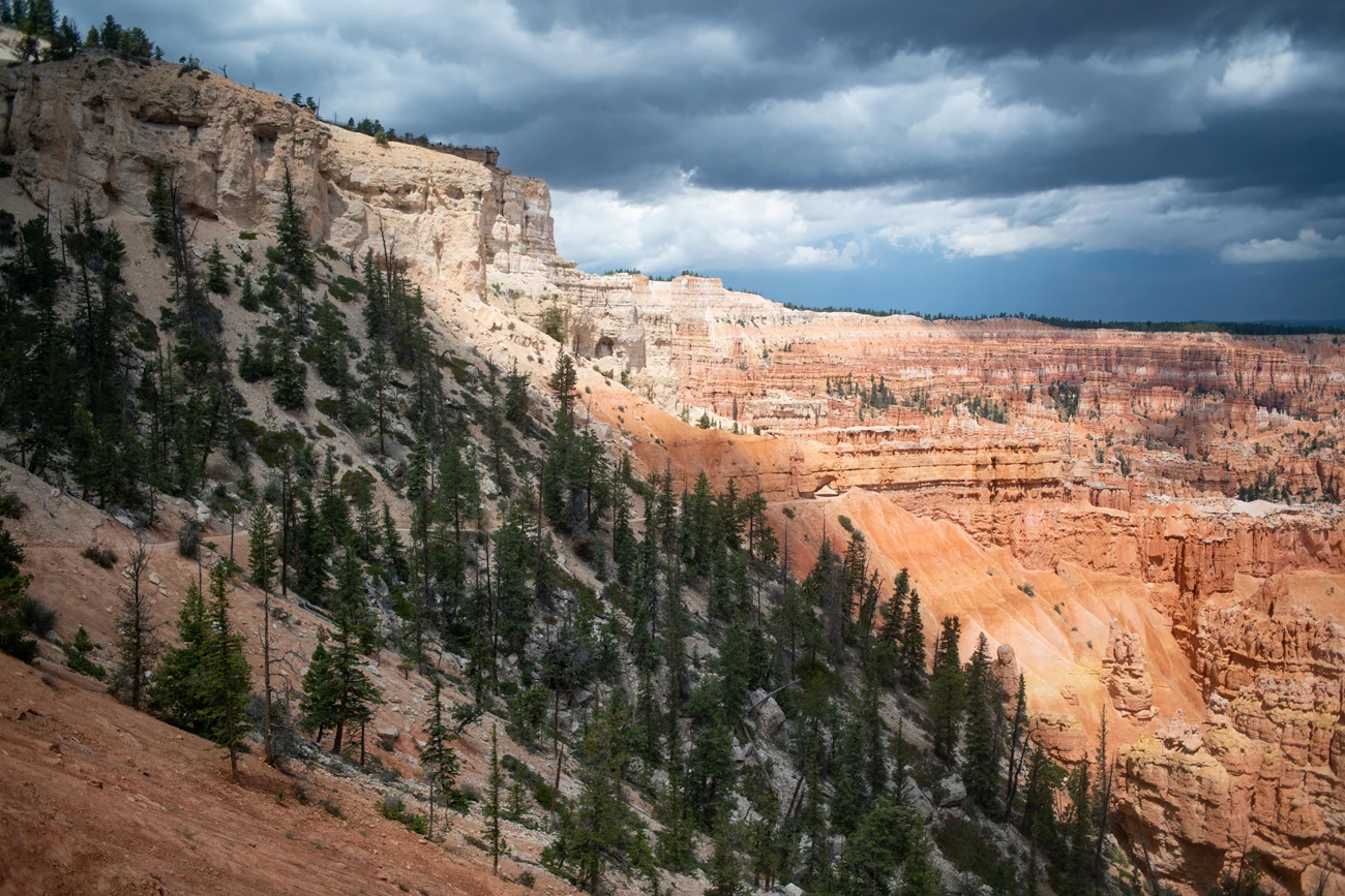 Peekaboo A mountain slope descends into a canyon filled with red rock formations