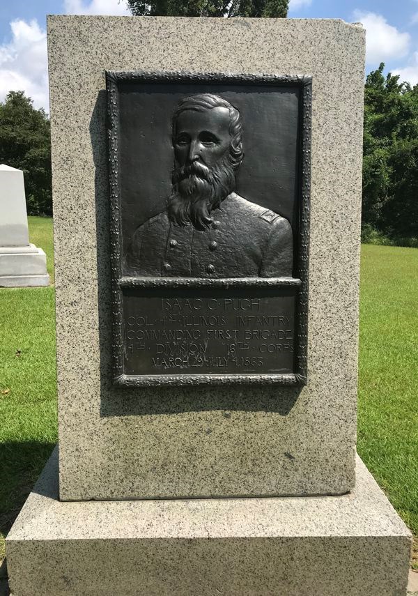 Bronze relief portrait of Isaac Pugh.