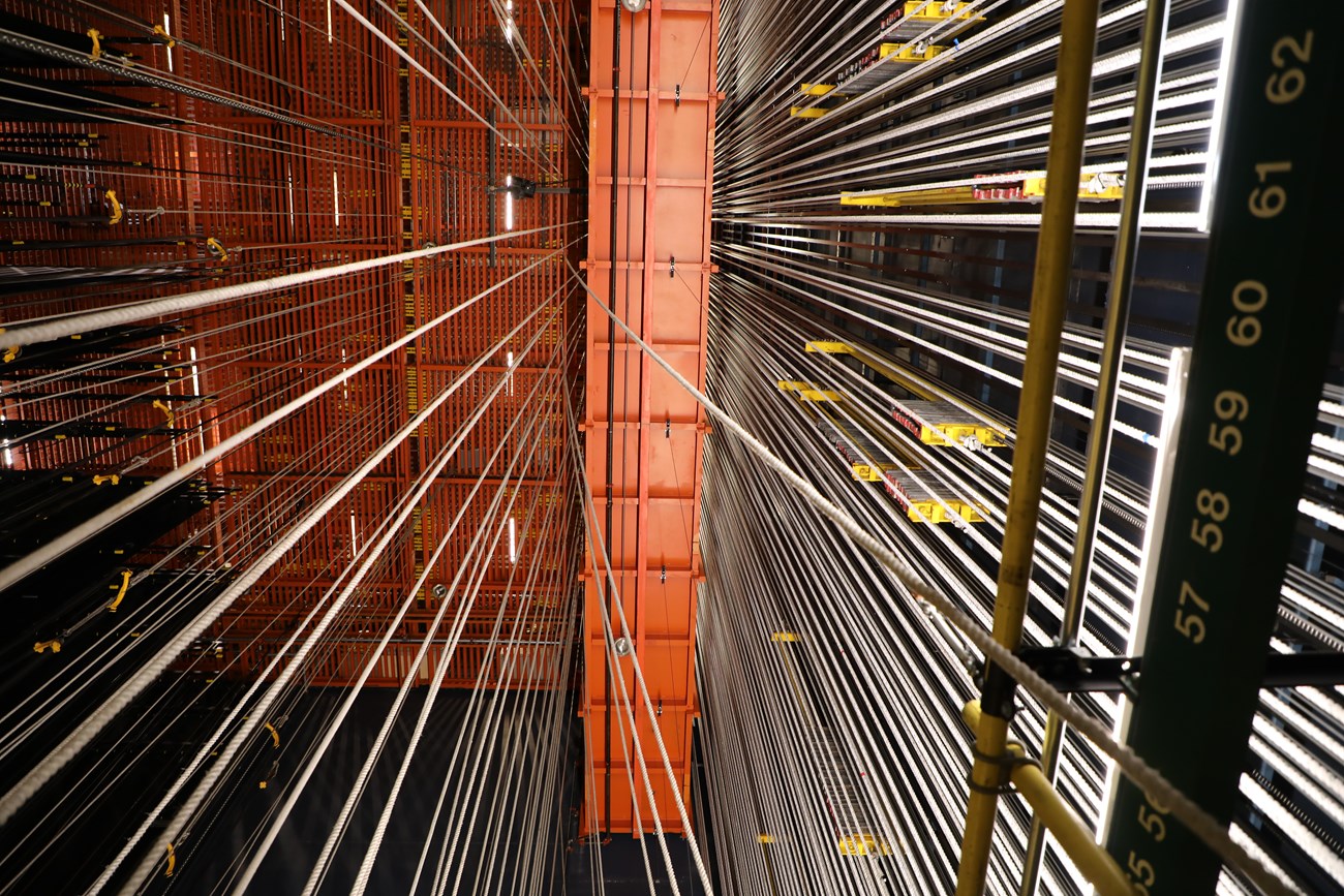 An upward shot of the Fly Line System inside of the Filene Center.