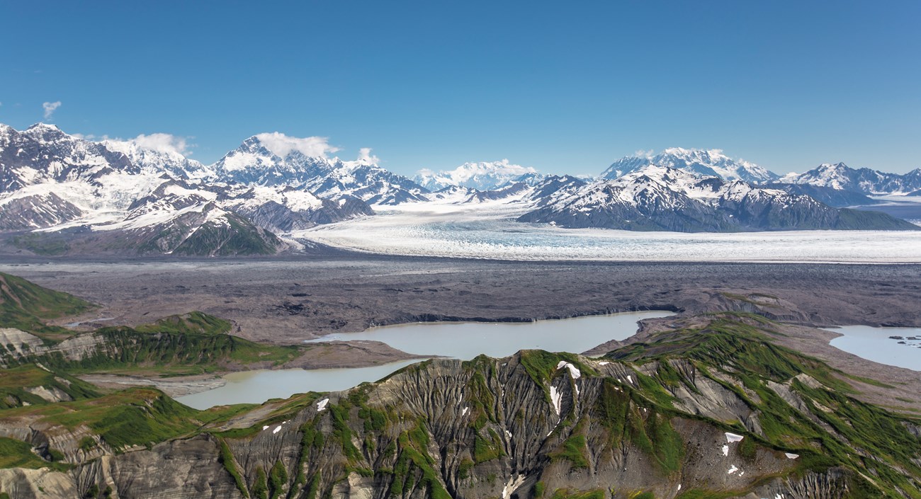 view of valley with mountains, glaciers and lakes