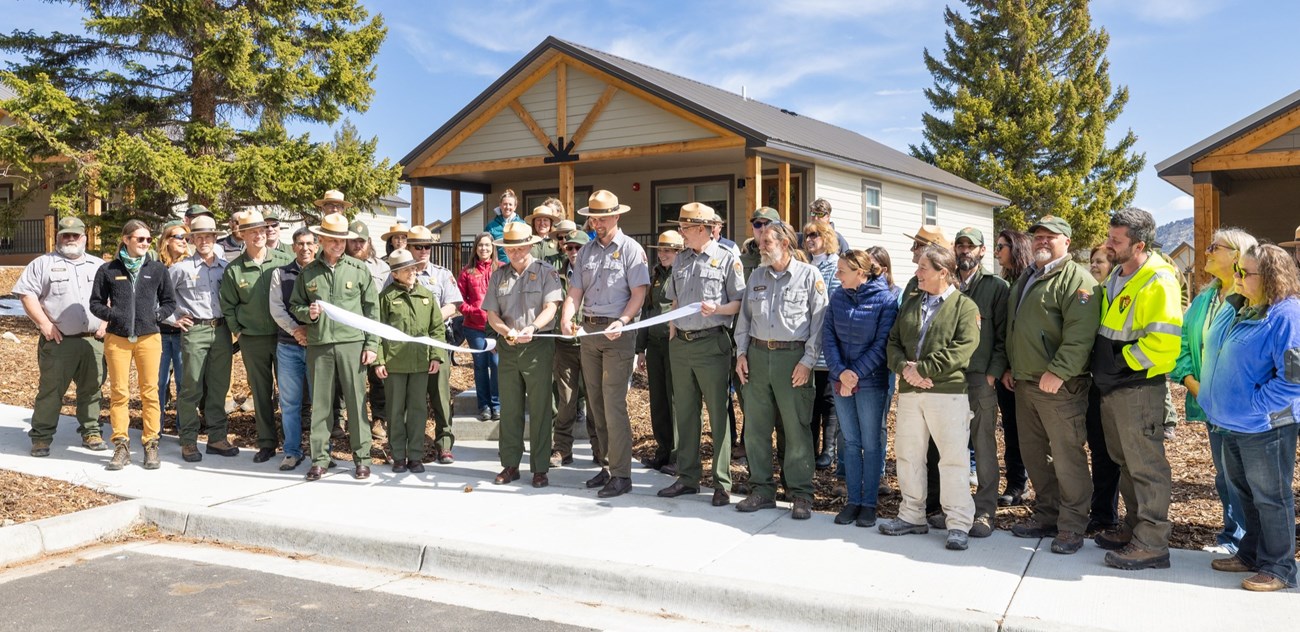 Cam Sholly, superintendent, and Kyle Stone, civil engineer, cut the ribbon