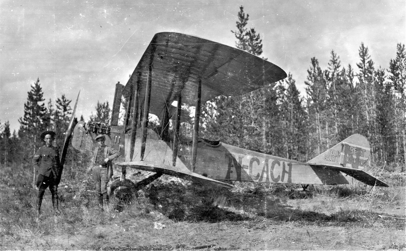 Clarence O. Prest poses in Whitehorse, Yukon with an RCMP officer.  He planned to fly his bi-plane Polar Bear II to Siberia in 1922, but the attempt ended in a tundra bog near today’s Yukon-Charley Rivers National Preserve.