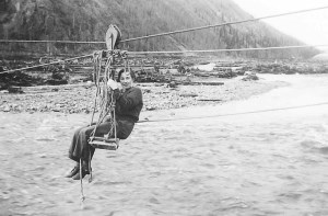 Mildred Hendricks crossing Coal Creek on a cable hand tram